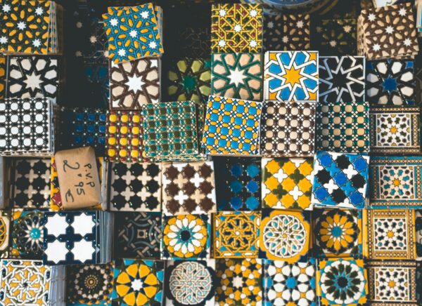 A bunch of different colored tiles on display